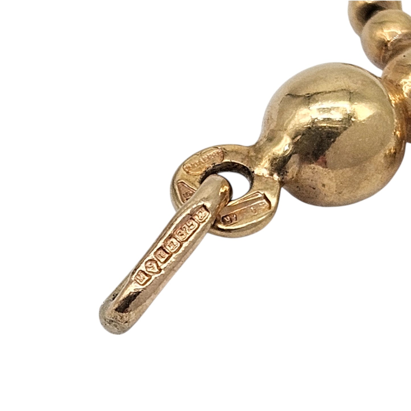 Unoaerre 9ct 375 Yellow Gold Articulated Doll Charm L 2.5 cm 1.9 g.