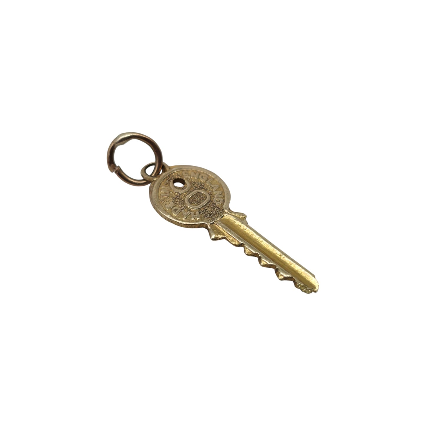 9ct 375 Yellow Gold Key Charm 1969 L 1.7 cm 0.4 g.