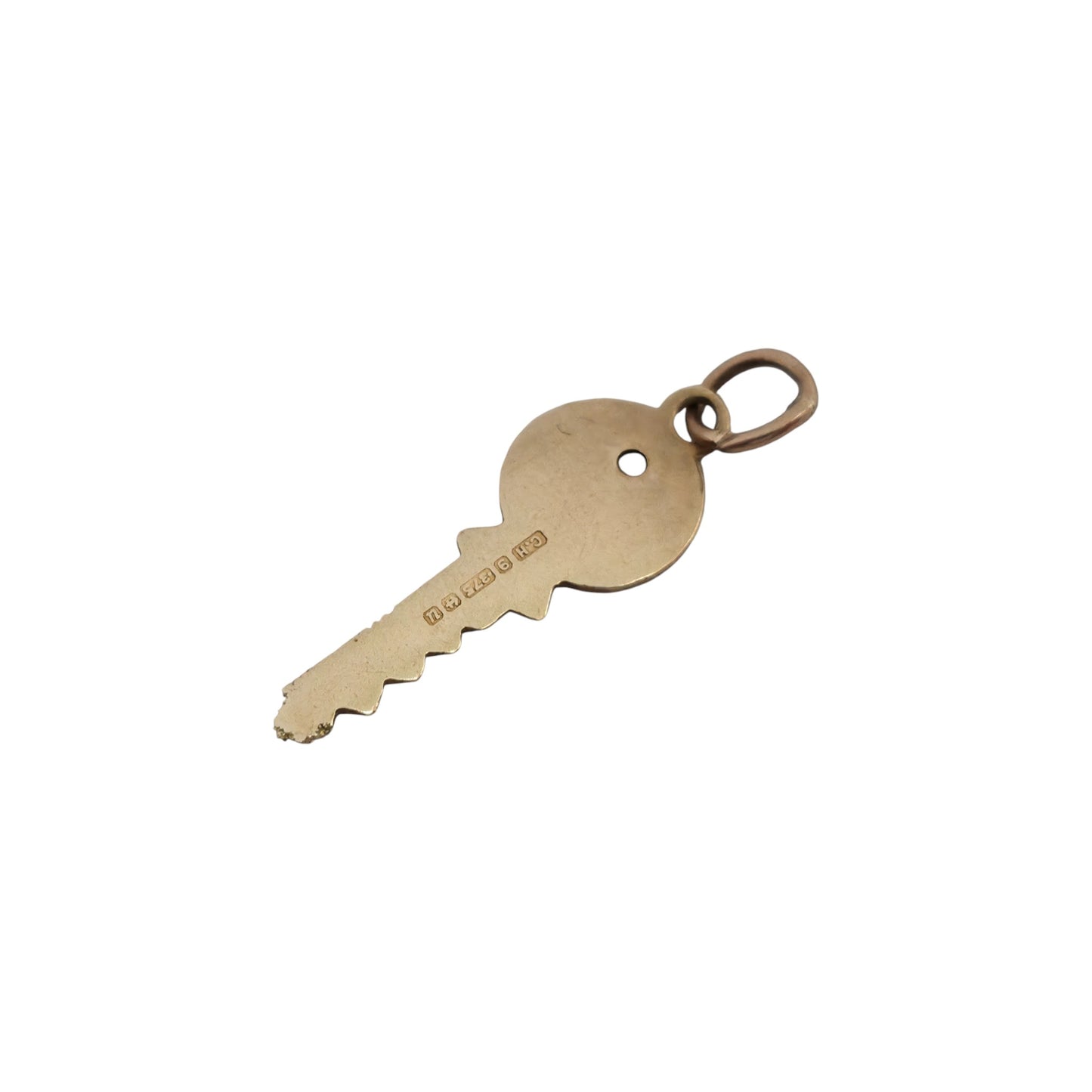 9ct 375 Yellow Gold Key Charm 1969 L 1.7 cm 0.4 g.