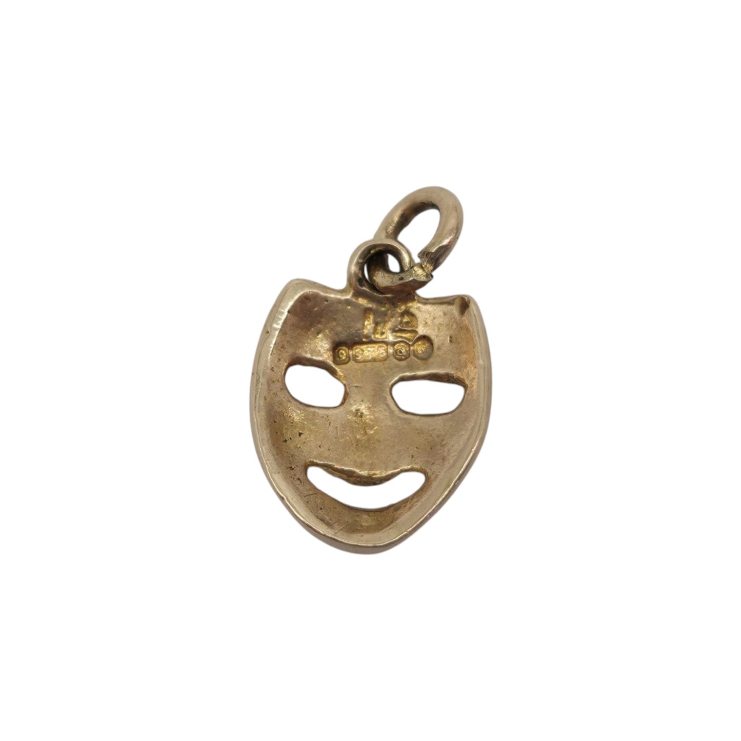 9ct 375 Yellow Gold Mask Charm 1956 L 0.9 cm 0.8 g.