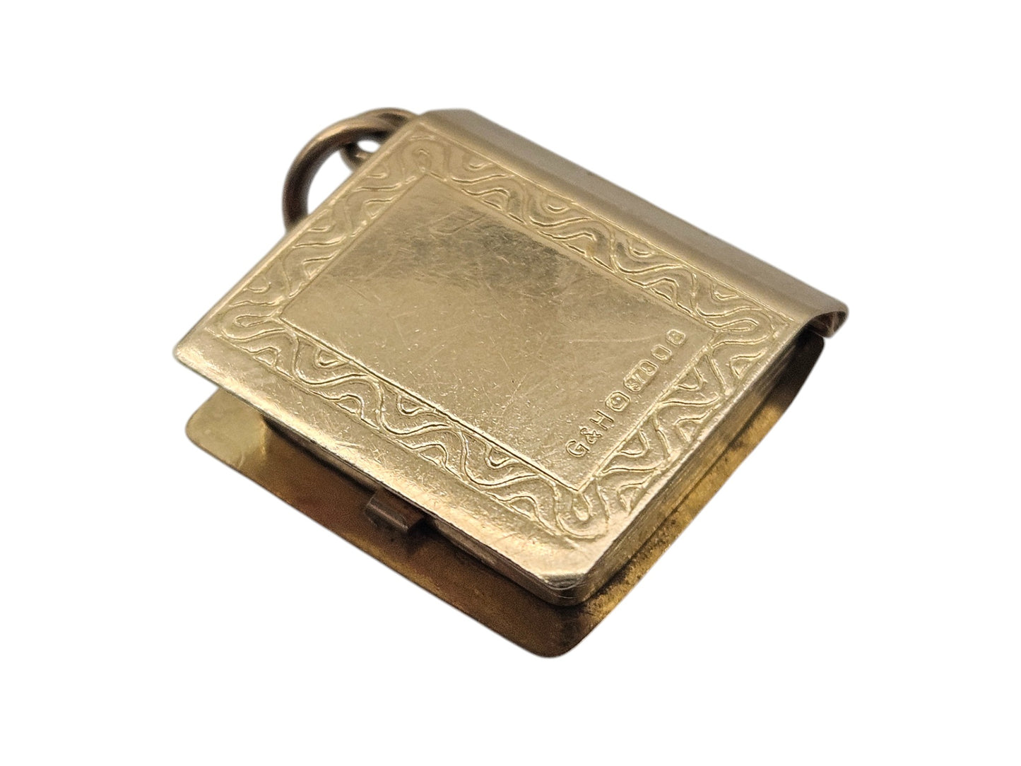 9ct 375 Yellow Gold Holy Bible Opening Charm 1979 L 1.4 cm 2.1 g.