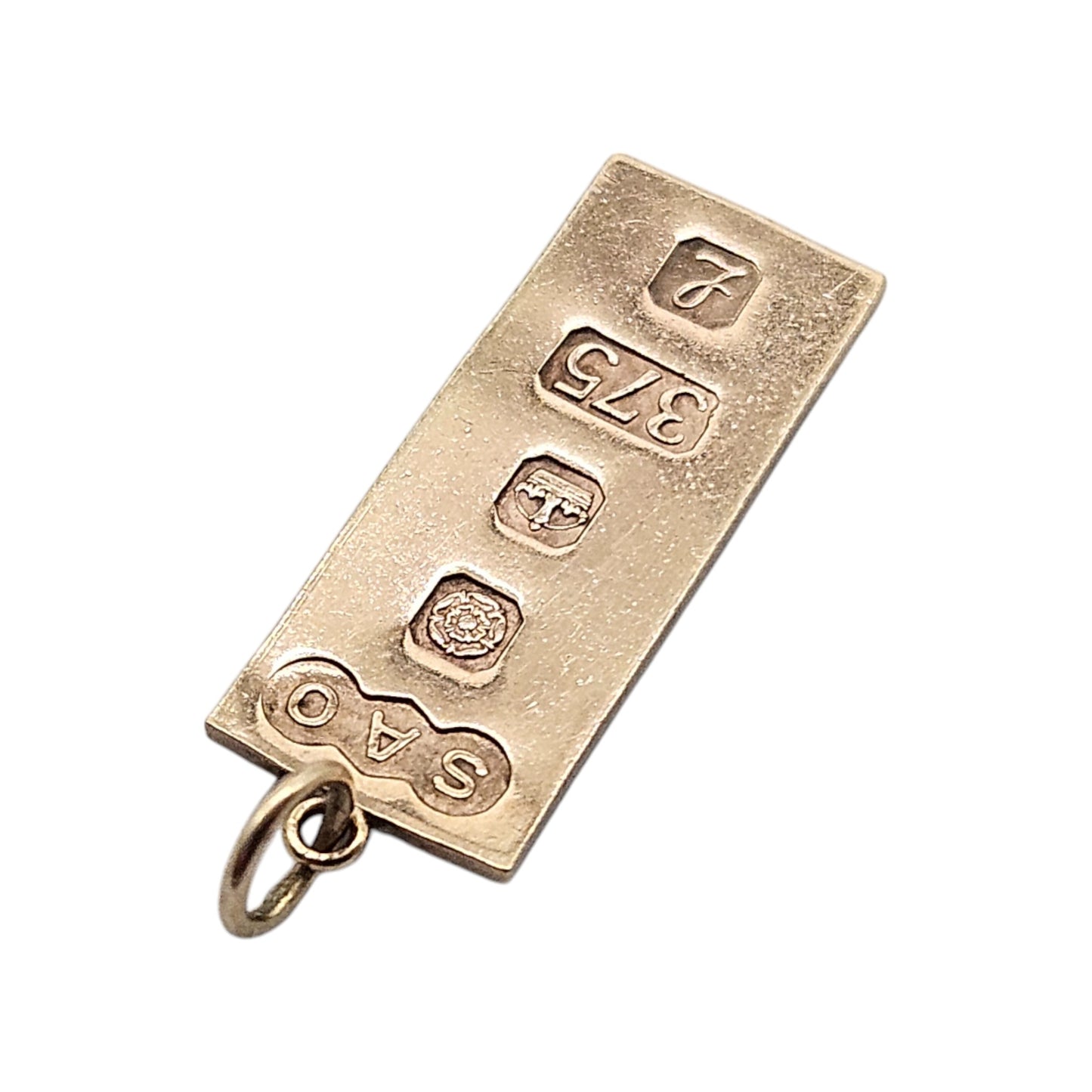 9ct 375 Yellow Gold Ingot Charm 1985 L 2.2 cm 1.9 g.