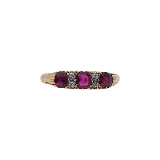 Victorian 18ct gold Ring set with three Ruby and four Diamonds