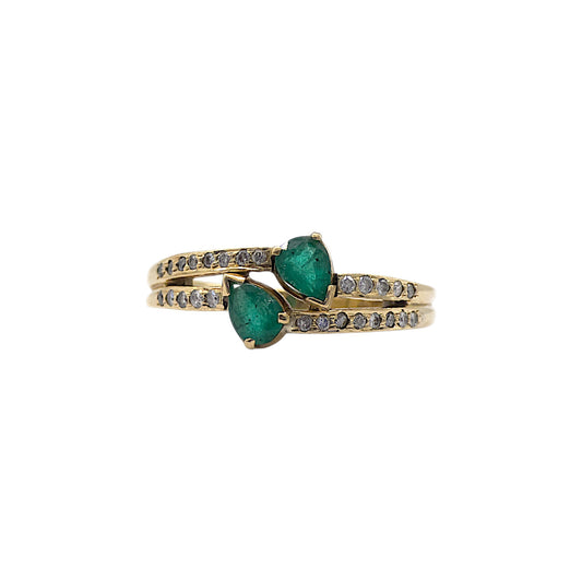 18ct gold Crossover Ring with two Emeralds and Diamond shoulders
