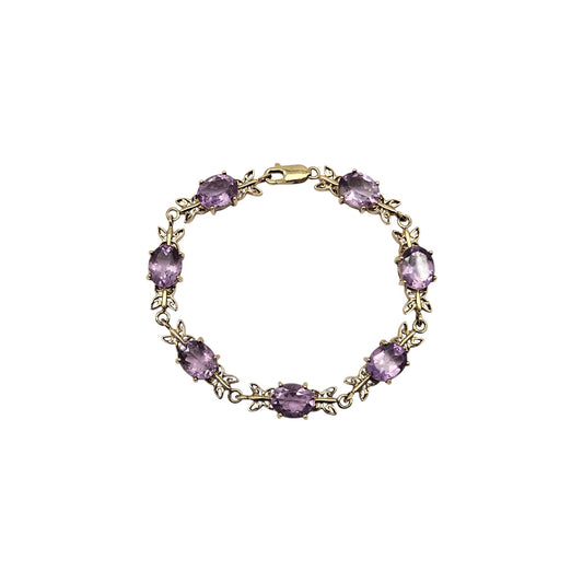 9ct gold Ladies Bracelet set with 7 amethysts and a lobster clasp