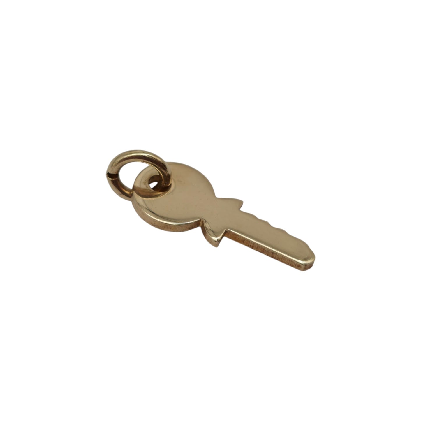 9ct 375 Yellow Gold Key Charm 1982 L 1.5 cm 0.7 g.