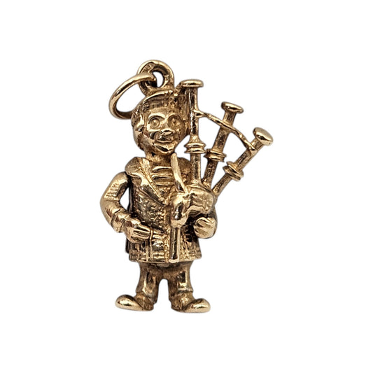 9ct 375 Yellow Gold Highland Bagpiper Articulated Charm L 1.7 cm 2.6 g.